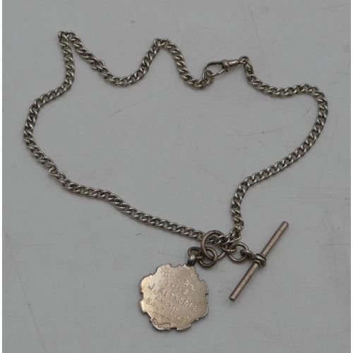 496 - A silver watch chain with T-bar and a shooting medal, 30.6g