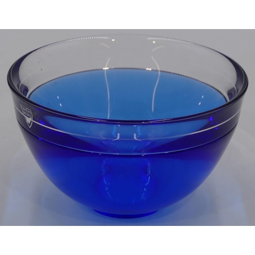 51 - An Orrefors blue glass small round trumpet shaped bowl, signed and labelled, 13.8cm diameter.