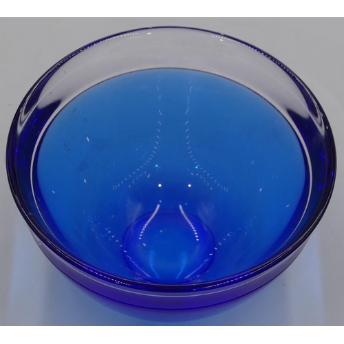 51 - An Orrefors blue glass small round trumpet shaped bowl, signed and labelled, 13.8cm diameter.