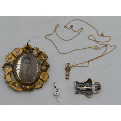 535 - A small 9ct gold drop pendant with chain, a 9ct white gold pendant, a 19th Century gold plated mourn... 