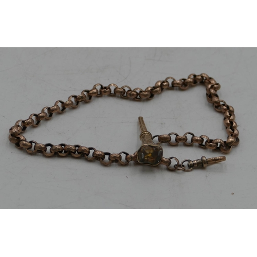 542 - A gold linked chain. 36.5cm long mounted with small gold propelling pencil, inset with clear stone, ... 