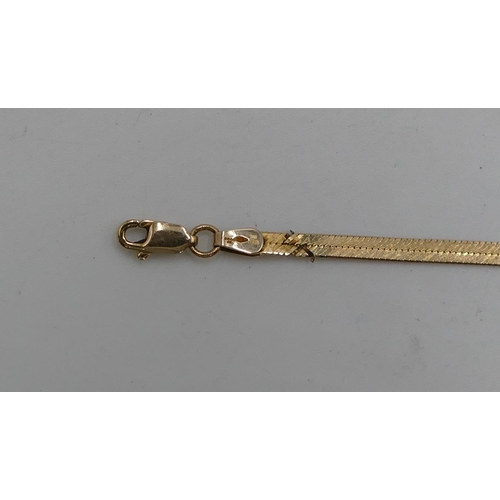 572 - A 9ct gold flat necklace. 40.5cm long. 4.5g