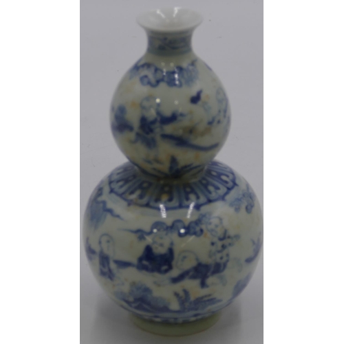 61 - An Oriental blue and white round double gould vase with children and landscape decoration, 18.5cm hi... 