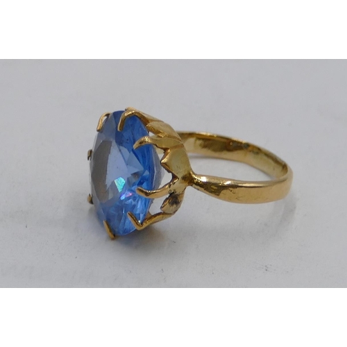 611 - A Continental gold ladies ring with circular pearl blue stone, size L, 4.9 grams gross