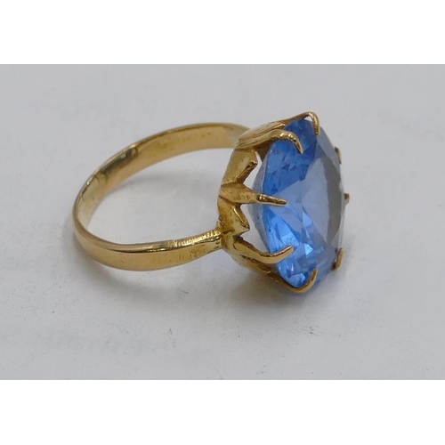 611 - A Continental gold ladies ring with circular pearl blue stone, size L, 4.9 grams gross