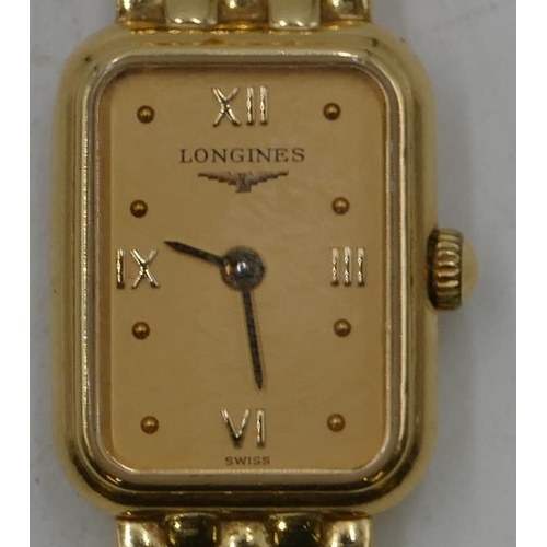 624 - A Ladies Longines 18ct gold tank shaped wrist watch with matching strap bracelet, overall weight inc... 