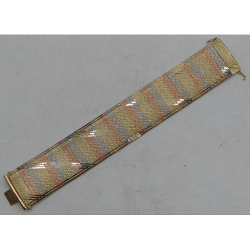 625 - A 14ct 3 colour gold wide band bracelet, allover etched decoration, 19.2cm long, 43.1g