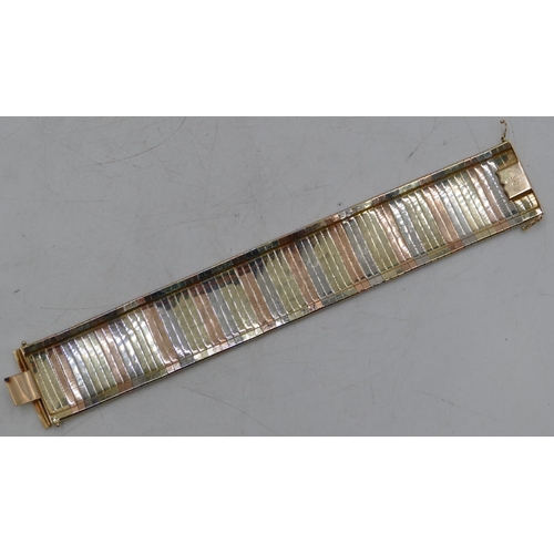 625 - A 14ct 3 colour gold wide band bracelet, allover etched decoration, 19.2cm long, 43.1g