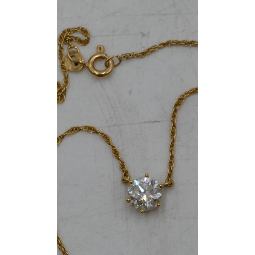 652 - An 18ct gold solitaire diamond pendant with chain, diamond approx. 1.40ct, 41cm long