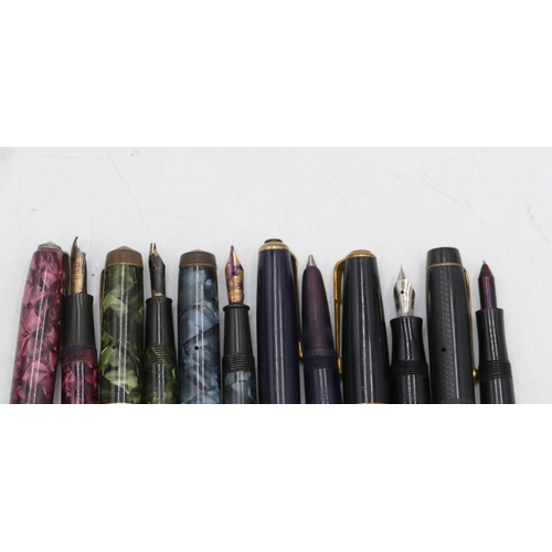 660 - Conway Stewart 388 green mottled fountain pen, a similar grey mottled fountain pen and a Conway Stew... 