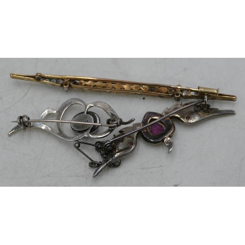 667 - A silver winged heart shaped brooch set with amethyst and half pearls, 5.5cm wide and 2 other silver... 