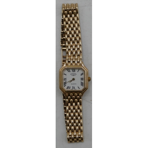 672 - A 9ct gold ladies Rotary Quartz wristwatch with matching 9ct gold gate style bracelet, overall weigh... 