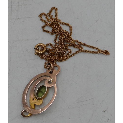 679 - An oval gold pendant mounted with pale green stone (cracked), with gold chain, 3.2 grams gross.