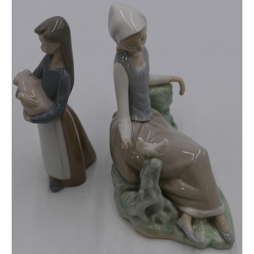 68 - A Lladro figure of a seated lady with bird, 17cm high, and a LLadro figure of a young girl holding a... 