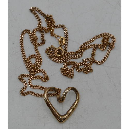 680 - A gold heart shaped pendant with gold chain, 6.5 grams.