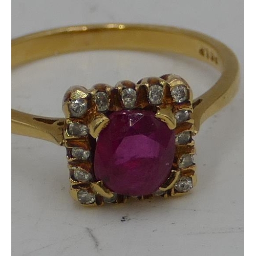 683 - An 18ct gold square set ladies ring set with centre ruby and surrounded by 16 small diamonds, size P... 
