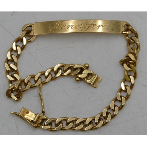 684 - An 18ct gold flat linked identity bracelet marked 