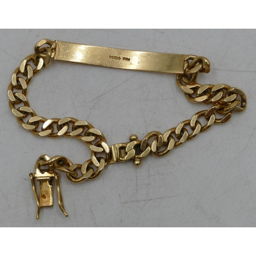 684 - An 18ct gold flat linked identity bracelet marked 