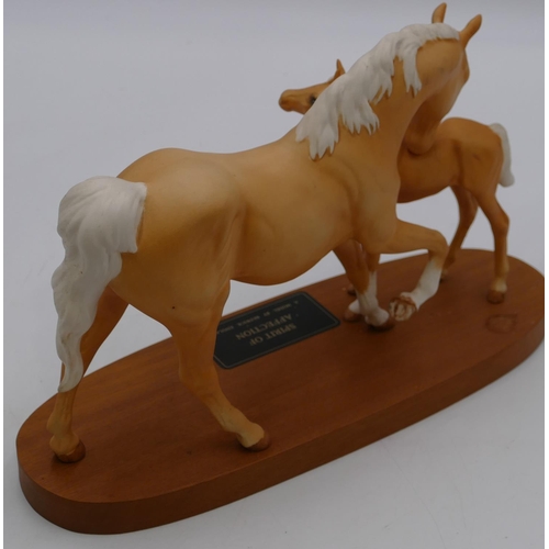 69 - A Beswick palomino mat horse 