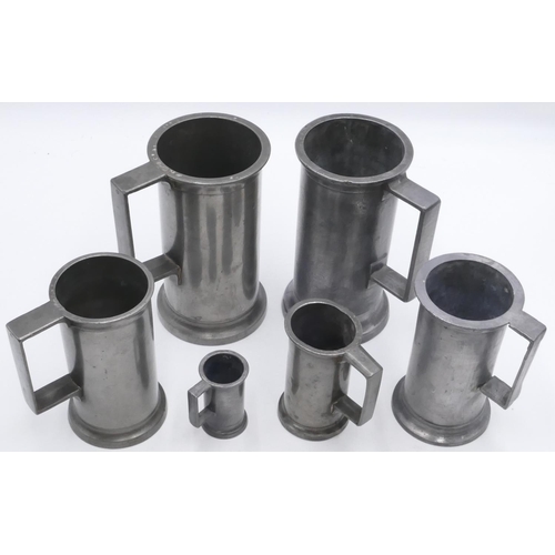 693 - 6 various Continental pewter measures 2 x 1 litre measures, 2 medium, 15cm high and 2 smaller measur... 