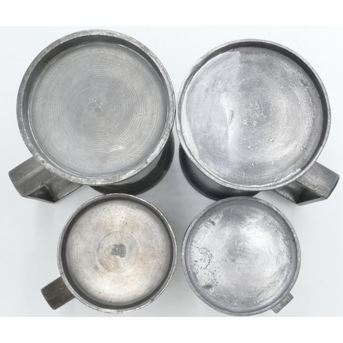 693 - 6 various Continental pewter measures 2 x 1 litre measures, 2 medium, 15cm high and 2 smaller measur... 