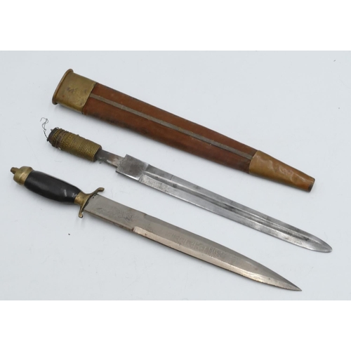 710 - A dagger with gilt metal and cloth scabbard (part of handle missing and in need of restoration), 40.... 