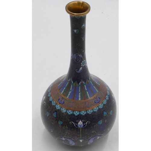 722 - An Oriental Cloissonne round bulbous thin necked vase on blue ground with coloured floral, leaf and ... 