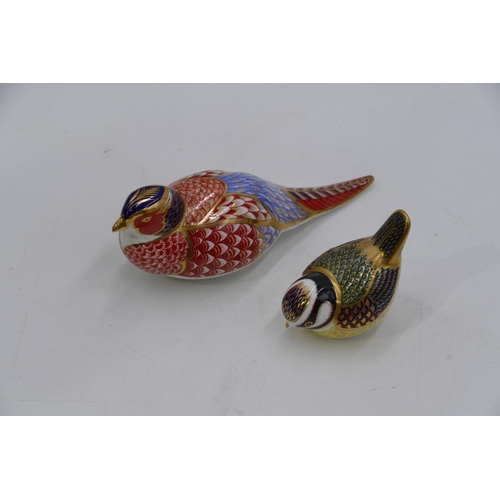 73 - 2 Royal Crown Derby paperweights in form of birds with gold coloured stoppers, largest 17.5cm long. ... 