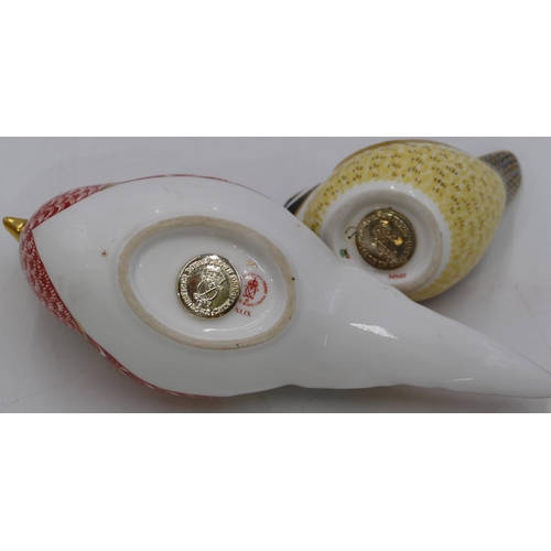 73 - 2 Royal Crown Derby paperweights in form of birds with gold coloured stoppers, largest 17.5cm long. ... 