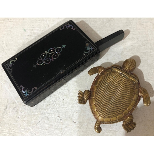 731 - A novelty brass vesta case in the form of a tortoise and a black lacquered vesta case in the form of... 