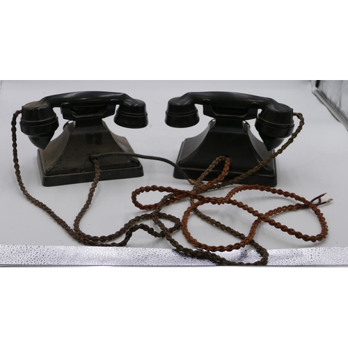 734 - 2 black Bakelite telephones, handsets stamped 164 55 and 164 51. (2)