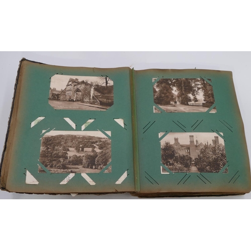 743 - A postcard album containing Surrey views etc.