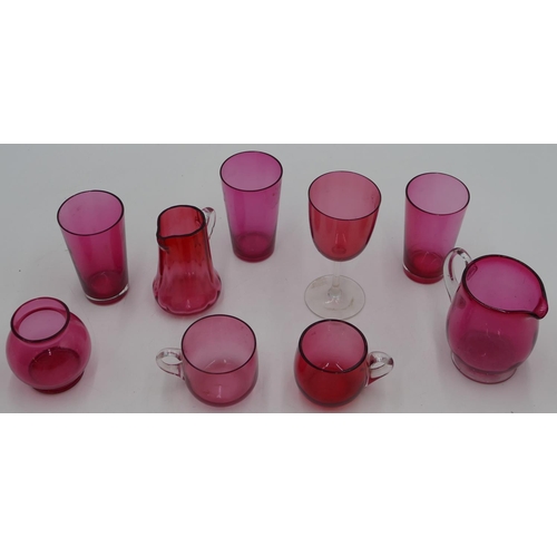 75 - 2 Cranberry glass jugs, 1 vase (small chip to rim) and 6 various Cranberry glasses. (9)