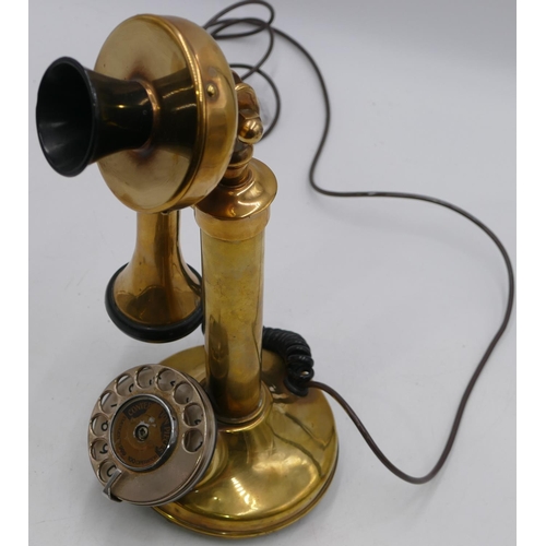 753 - A brass stick telephone, 33cm high.