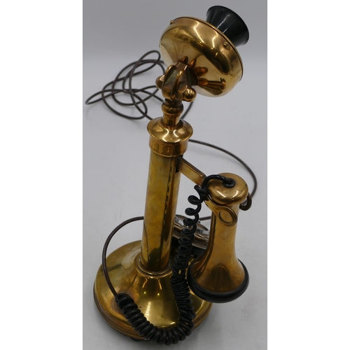 753 - A brass stick telephone, 33cm high.