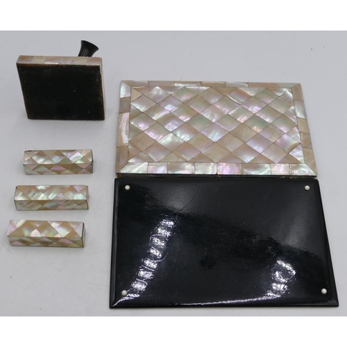 787 - A Mother of Pearl and papier mache rectangular shaped desk blotter with hinged front, 23cm wide, a s... 