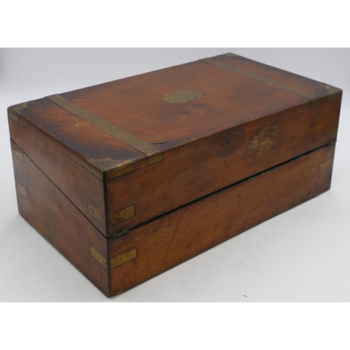 804 - A 19th Century walnut rectangular shaped writing box with gilt metal mounts and banding, hinged lid ... 