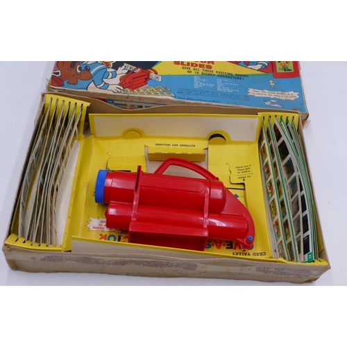 816 - A Chad Valley Disneyland Give a Show Projector with slides (boxed) (box in need of restoration)