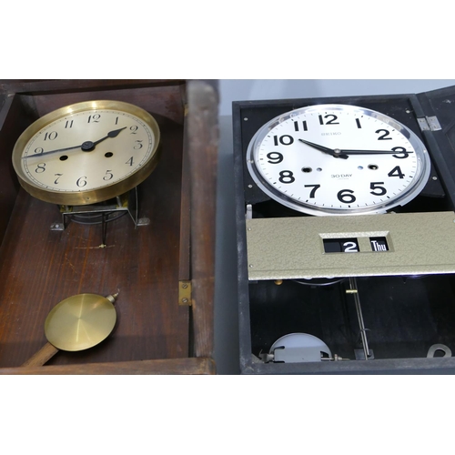 837 - A 1930's oak 8-day striking wall clock 63cm high, a Seiko 30-day wall clock with calendar and a roun... 