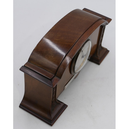 840 - An Edwardian mahogany mantel clock with carved leaf and scroll decoration, silvered dial with Roman ... 