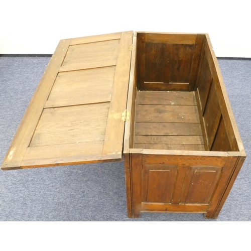 856 - An early 20th Century dower chest with triple panelled hinged top, carved triple panelled front and ... 