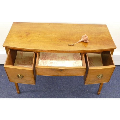 859 - A 19th Century mahogany bow fronted side table with centre drawer above knee hole, flanked by 2 deep... 