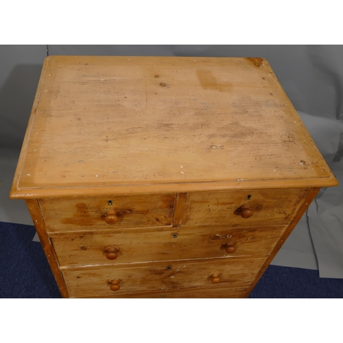 885 - A pine tall narrow straight front chest of drawers, 2 short, 4 long graduated drawers with later woo... 