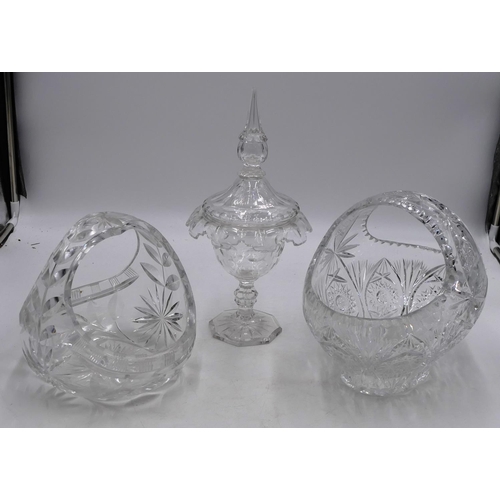 89 - A cut glass lidded pot with crinkled rim and allover thumb pattern decoration, hexagonal base, 31cm ... 
