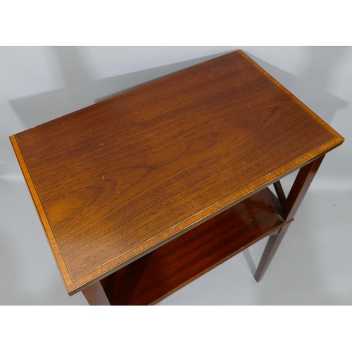 900 - A mahogany rectangular shaped bookshelf with banded top, X-shaped ends, with under tier and on squar... 