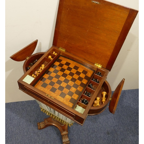 904 - A 19th Century mahogany work box/games table with bowed ends, hinged lid enclosing reversible cover ... 