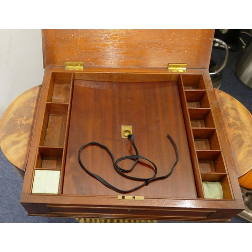 904 - A 19th Century mahogany work box/games table with bowed ends, hinged lid enclosing reversible cover ... 