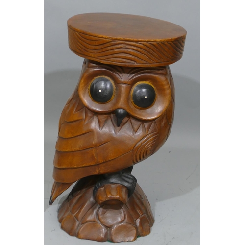 907 - A 20th Century carved wooden stool in the form of an owl, 51cm high