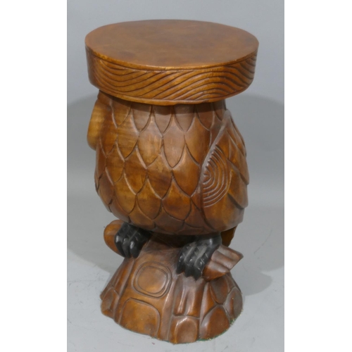 907 - A 20th Century carved wooden stool in the form of an owl, 51cm high