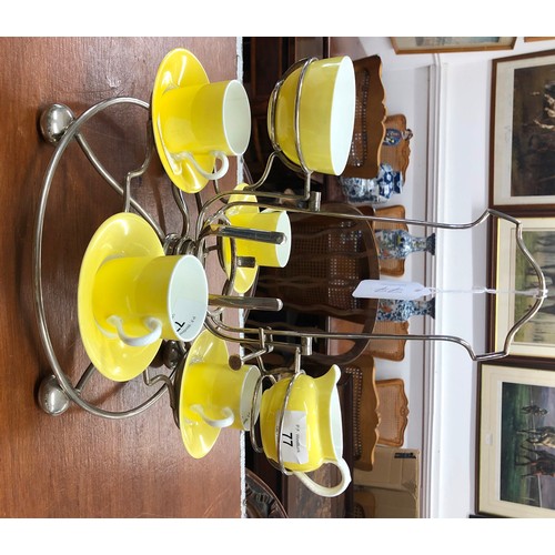 77 - George Jones, Crescent china part coffee service on white and yellow ground, with plated stand, milk... 